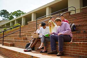 A group of students outside at the amphitheater.