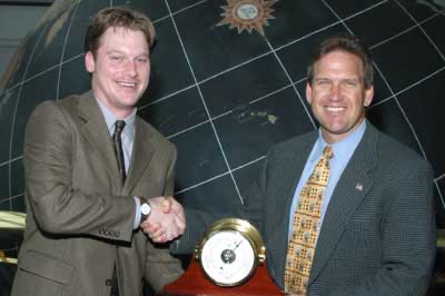 Mike Leach (r), plant manager at the Exxon Mobil refinery in the south Mobile County, presents the 2004 Exxon Mobil Academic Award to Chris Franklin (l).