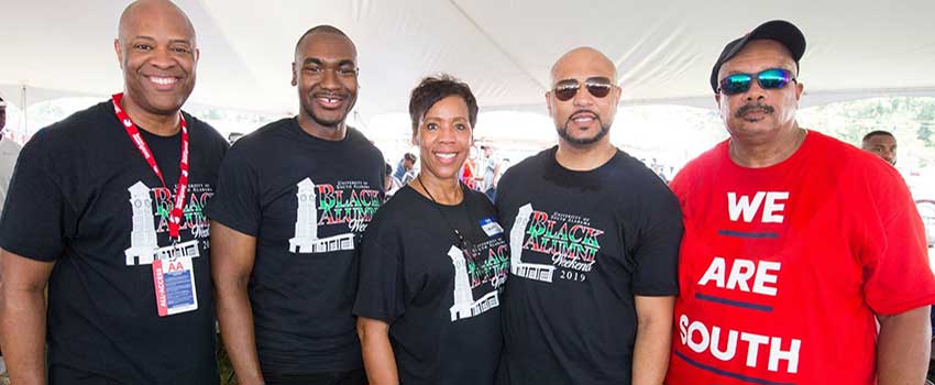 Members of the Black Alumni Society tailgating.