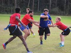 Students playing flag football