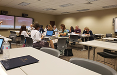 Faculty and Staff in a learning session.